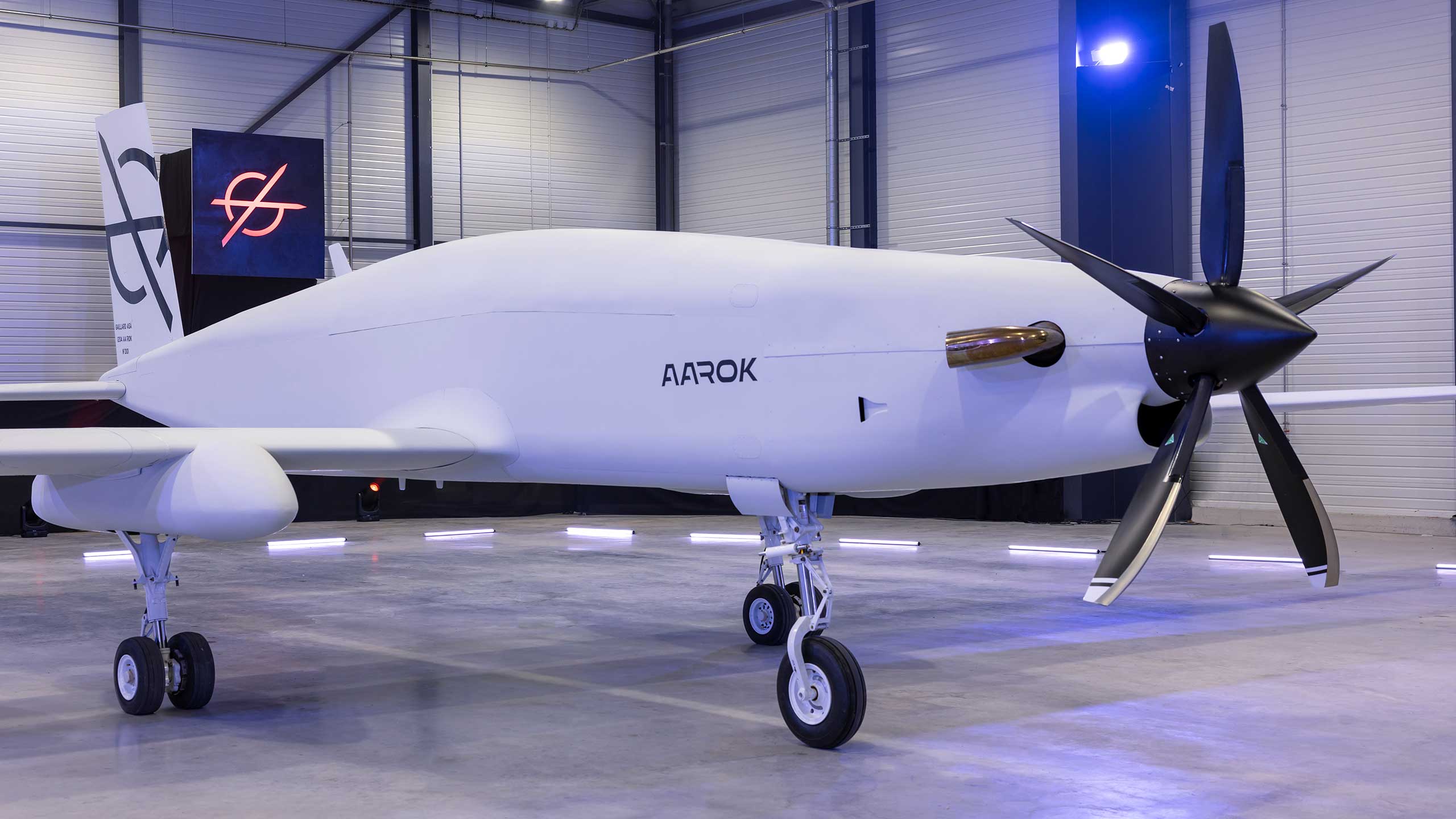 AAROK heavy uncrewed aircraft displayed inside an industrial hangar.