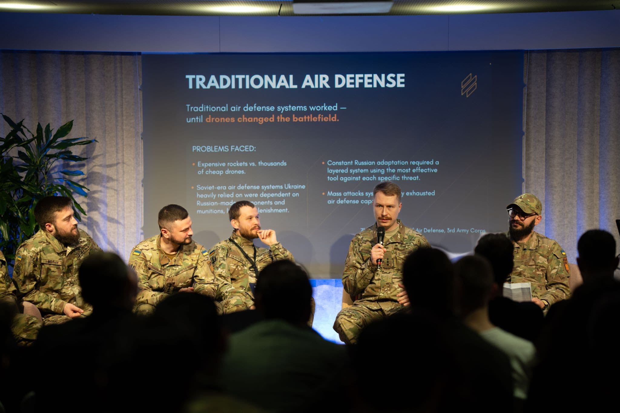 Ukrainian defence practitioners discussing drone warfare and European security in Munich.